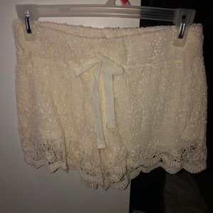 Cream colored lace shorts. Size small